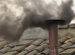 Black smoke rises from the chimney on the Sistine Chapel, in this still image taken from video, indicating no decision has been made after the first voting session on the second day of the election of a new pope, at the Vatican, March 13, 2013. Roman Catholic Cardinals will continue their conclave meeting inside the Vatican's Sistine Chapel. REUTERS photo