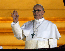 Original Pope Francis waves to the crowd from the central balcony of St. Peter's Basilica at the Vatican, Wednesday, March 13, 2013. Cardinal Jorge Bergoglio who chose the name of Francis is the 266th pontiff of the Roman Catholic Church. AP Photo