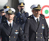 This photograph taken on December 22, 2012, Italian marines Massimiliano Latorre (R) and Salvatore Girone (L) arrive at Ciampino airport near Rome. India's Supreme Court on March 14, 2013, issued an order to Italy's ambassador to stay in the country for four days amid a dispute over two Italian marines who skipped bail while on trial in New Delhi. Rome announced on March 11, that Massimiliano Latorre and Salvatore Girone, who face murder charges over the death of two Indian fishermen in February last year, would remain in Italy. AFP PHOTO/
