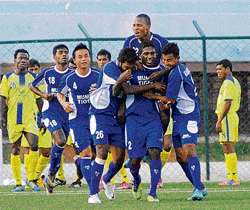 Man of the moment Mumbai Tigers N&#8200;P Pradeep (2) is mobbed by his team-mates after scoring against Kalighat on Thursday. DH&#8200;photo/ Kishor Kumar Bolar