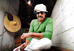 Wearing too many hats Upendra in the film.