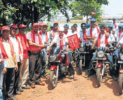 Indian Red Cross Society (DK district) President Dr Muralee Mohan Choonthar flags off 'Spandana Yatra,' a bike rally to spread the message of blood donation to different parts of undivided DK district, in Mangalore on Saturday.