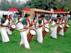 Rythmic :A troupe from Kerala (above and below) play Cheda, a percussion instrument.