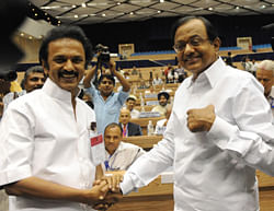 In this photograph taken on August 16, 2009, then Deputy Chief Minister of the Indian state of Tamil Nadu M. K. Stalin (L) shakes hands with then Home Minister P. Chidambaram during the inauguration of the Chief Ministers Conference on Internal Security in New Delhi. AFP