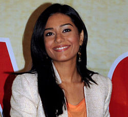 Amrita Rao poses during a media event for the Hindi film 'Jolly LLB' in Mumbai on March 20, 2013. AFP PHOTO