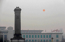 environmental woes: The sun rises at Tiananmen Square on a hazy day in Beijing. AP