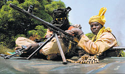 gaining ground: Rebels of the Seleka coalition in the Central African Republic patrol a road 12 km from the city of Damar in this January 10, 2013, photo. AFP