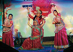 Vibrant: Artistes from Rajasthan showcase the traditional form of Holi celebration.
