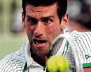 intense: Serbian Novak Djokovic returns during his win over Indias Somdev Devvarman in Miami on Sunday. AFP