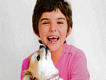Emily Whitehead with her dog. AFP file photo