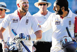 Super act: Matt Prior (left) and Monty Panesar walk back after helping England save the Test on Tuesday. afp