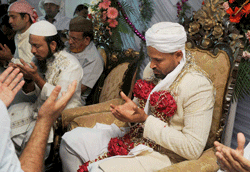 Mumbai : Cricketer Yusuf Pathan offering prayer on his wedding in Mumbai on Wednesday PTI Photo