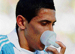 booster: Argentinas Angel di Maria takes in oxygen during the clash against Bolivia at high altitude La Paz. afp