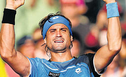 gritty show: Spains David Ferrer celebrates his win over Austrian Jurgen Melzer in the quarterfinals of the Miami Masters on&#8200;Thursday. AFP