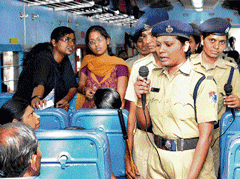 public service Female train escorts of the Railway Police Force creating awareness among female passengers on the Janshatabdi Express in Hubli. DH photo