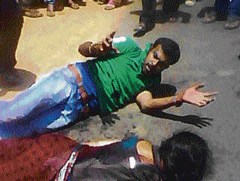 Gruesome scene:  A mobile phone grab of Sonams alleged assailant Abhishek, after he had stabbed her. DH photo