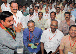 Planning: BJP State President Pralhad Joshi and party members at a workshop in Bangalore on Thursday. DH Photo