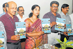 Financial Inclusion: (From left) Chief manager of State Bank of Mysore (SBM), M B Chinnappa, Deputy Commissioner C Shikha, incharge CEO of zilla panchayat N D Prakash and general manager of SBM D K Lakshmisha during the  launch of district credit plan at zilla panchayat premises, in Mysore, on  Thursday . DH PHOTO