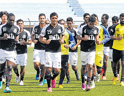 Eyeing a return: Mohammedan Sporting players train at the Bangalore Football stadium on Friday. DH photo