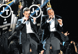 Justin Timberlake performs with rapper Jay-Z during one of his concerts.