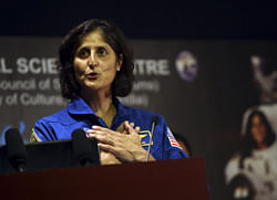American astronaut of Indian origin Sunita Williams gestures during her interaction with students at the National Science Center in New Delhi, Monday, April 1, 2013. Williams, 47, who lived and worked aboard the international space station for six months in 2006, is on a visit to India. AP Photo