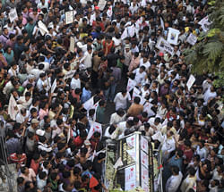 early goodbye: People pay homage during the funeral procession of SFI leader Sudipto Gupta, who allegedly died after a clash with Kolkata Police, in Kolkata on Wednesday. PTI