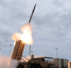 This March 18, 2009 handout image courtesy of the US Missile Defense Agency shows the launch of the Terminal High Altitude Area Defense (THAAD) missile during a test. The United States is to deploy a THAAD missile defense battery to defend its bases on the Pacific island of Guam, the Pentagon said on April 3, 2013 following threats from North Korea. The news that the ground-based system would be in place in the coming weeks came after two Aegis anti-missile destroyers were sent to the western Pacific to intercept any North Korean strike against US or allied targets. The THAAD (Terminal High Altitude Area Defense) is a truck-mounted system that can pinpoint an enemy missile launch, track the projectile and launch an interceptor to bring it down. AFP Photo