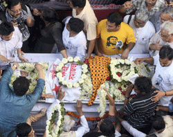 People pay homage during funeral procession of SFI leader Sudipto Gupta, who allegedly died after a clash with Kolkata police, at SFI headquater in Kolkata on Wednessday. PTI Photo