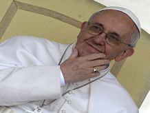 Pope Francis smiles on April 3, 2013 during his weekly general audience at Saintt Peter's square at the Vatican. AFP PHOTO