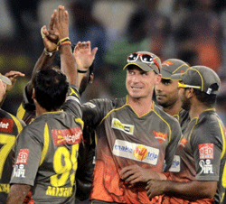 Sunrisers Hyderabad's bowler Dale Steyn (2nd R) celebrate with team members after taking a wicket against Pune Warriors during the IPL 6 match in Hyderabad on Friday. PTI Photo