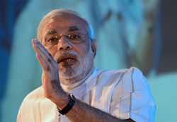 Gujarat Chief Minister Narendra Modi delivers his speech at the annual general meeting of the Federation of Indian Chambers of Commerce and Industry (FICCI) Ladies Organisation (FLO) as in New Delhi on April 8, 2013.