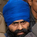 * Davinder Pal Singh Bhullar, convicted in a bomb blast case near Indian Youth Congress office, being produced in a court in Chandigarh in 2005. The Supreme Court on Friday dismissed Bhullars plea for commutation of his death sentence to life imprisonment on ground of delay in deciding his mercy plea. PTI Photo