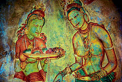 Paintings of apsaras (celestial maidens) at Sigiriya caves in Sri Lanka.