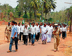 JD(S) workers carry out a procession before filing the nomination by its candidate Amarnath Shetty in Moodbidri.