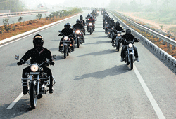 Riders of the Royal Knights Motorcycle Club sticking to formations  on the road.