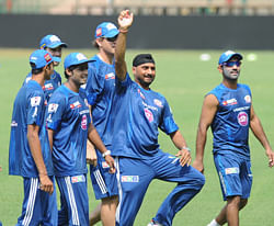 Harbhajan singh of Mumbai Indians have fun during the practice ahead of IPL match against RCB in Chinnaswami Stadium in Bangalore on Tuesday./Photo by Kishor Kumar Bolar