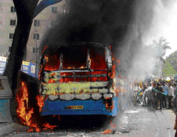 A BMTC bus caught fire after a short circuit in its engine near Yeshwantpur bus stand on Thursday. DH Photo