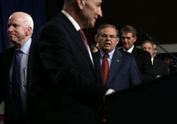 (L-R) U.S. Sen. John McCain (R-AZ), Sen. Charles Schumer (D-NY), Sen. Robert Menendez (D-NJ), Sen. Jeff Flake (R-AZ), Sen. Richard Durbin (D-IL), and Sen. Michael Bennet (D-CO) arrive at a news conference on immigration reform April 18, 2013 on Capitol Hill in Washington, DC. AFP