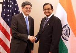 U.S. Treasury Secretary Jack Lew (L) shakes hands with India's Finance Minister Palaniappan Chidambaram before their meeting during the 2013 Spring Meeting of the International Monetary Fund and World Bank in Washington, April 19, 2013. REUTERS
