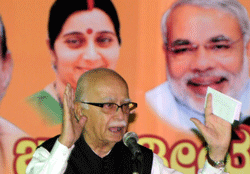 BJP leader L.K. Advani addressing a public meeting organised by District BJP unit at Maganur Basappa Rice Mill premises in Davangere on Sunday. DH photo