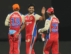 R P Singh of RCB celebrate his 2nd against RR during the IPL in Chinnaswami Stadium in Bangalore on Saturday./Photo by Kishor Kumar Bolar