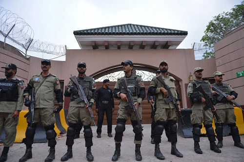 Pakistani paramilitary soldiers stand guard outside the residence of former Pakistani President Pervez Musharraf after a court has declared Musharraf's house a sub-jail in Islamabad on April 20, 2013. AFP