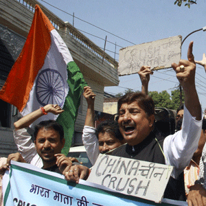 Activists of Jammu West Assembly Movement shout slogans during a protest against the China's intrusion into the Ladakh region in Jammu on Wednesday. PTI Photo