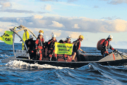 green crusaders A group of six activists from Greenpeace International, including  (inset: Gaurav Jagdish) cross the Great Barrier reef, to board the Korean coal ship,  protesting the expansion of coal exports from Australia.
