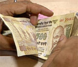 Rupee gains 19 paise vs dollar in the late morning trade