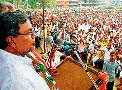 Opposition leader Siddaramaiah addresses a gathering at Holenarasipur, on Thursday. dh photo
