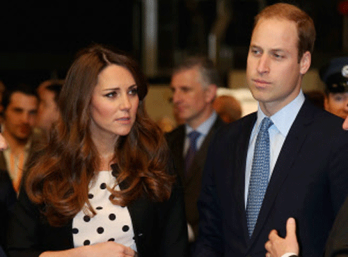 Britain's Kate the Duchess of Cambridge with her husband Prince William, right, and his brother Prince Harry, not pictured, attend the inauguration of 'Warner Bros. Studios Leavesden' near Watford, approximately 18 miles north west of central London, Friday, April 26, 2013. As well as attending the inauguration Friday at the former World War II airfield site, the royals will undertake a tour of Warner Bros. 'Studio Tour London - The Making of Harry Potter', where they will view props, costumes and models from the Harry Potter film series. AP Photo