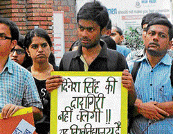 Furious DU students make their point silently.