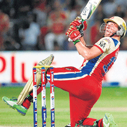 Royal Challengers Bangalore's AB de Villiers plays a scoop to third man en route  his fifty against Pune Warriors on Thursday. RCB&#8200;won by 17 runs. PTI