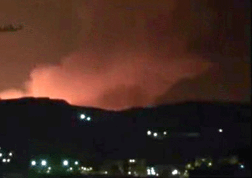 In this image taken from video obtained from the Ugarit News, which has been authenticated based on its contents and other AP reporting, smoke and fire fill the the skyline over Damascus, Syria, early Sunday, May 5, 2013 after an Israeli airstrike. Israeli warplanes struck areas in and around the Syrian capital Sunday, setting off a series of explosions as they targeted a shipment of highly accurate, Iranian-made guided missiles believed to be on their way to Lebanon's Hezbollah militant group, officials and activists said. The attack, the second in three days, signaled a sharp escalation of Israel's involvement in Syria's bloody civil war. Syria's state media reported that Israeli missiles struck a military and scientific research center near the Syrian capital and caused casualties. AP photo